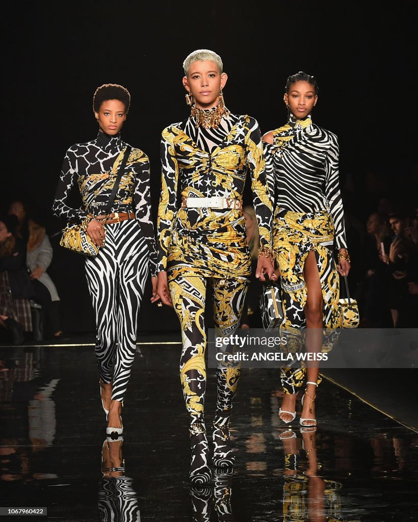 Models walk the runway at the Versace Pre-Fall 2019 Runway Show on ...