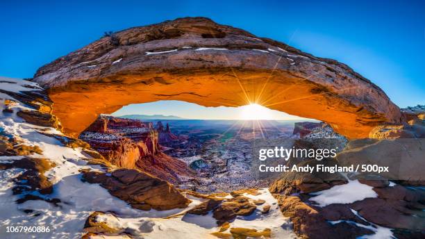 mesa arch at sunrise - mesa arch stock pictures, royalty-free photos & images