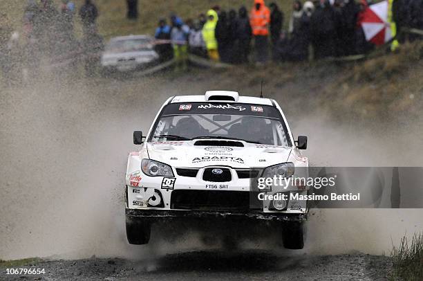 Mads Ostberg of Norway and Jonas Andersson of Sweden compete in their Subaru during Leg 1 of the WRC Wales Rally GB on November 12, 2010 in Cardiff,...