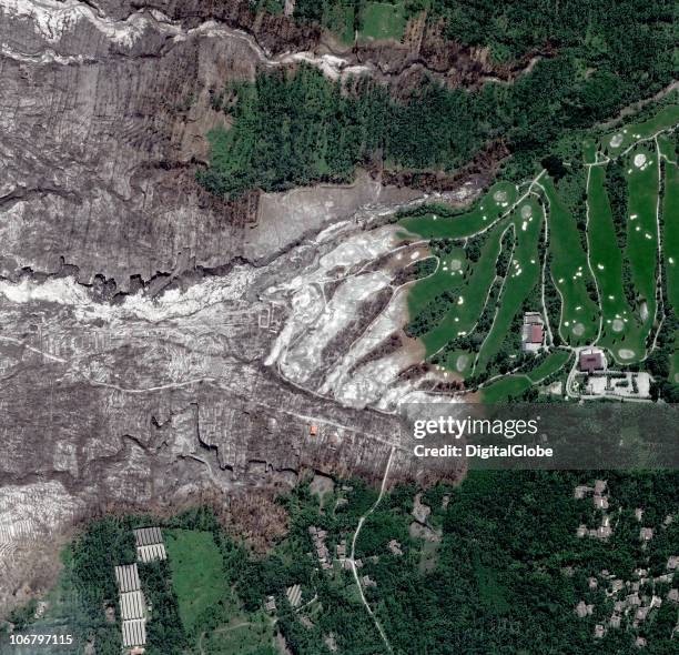 This satellite image shows the eruption and lava flowing into the Merapi Golf Course in Yogyakarta on November 11, 2010 of Mount Merapi, Indonesia....
