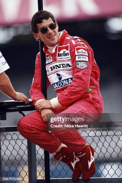 McLaren driver Ayrton Senna of Brazil relaxes during a Formula One testing session at Silverstone on July 7, 1992 in Towcester, England. .