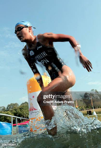 Akane Tsuchihashi of Japan competes in the Women's Individual Triathlon at the Triathlon Venue during day one of the 16th Asian Games Guangzhou 2010...