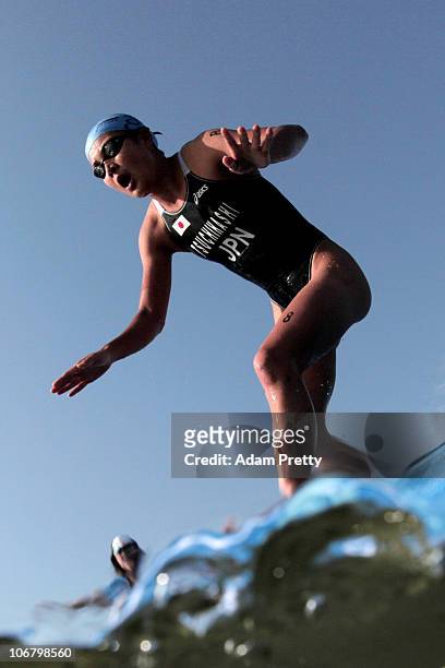 Akane Tsuchihashi of Japan competes in the Women's Individual Triathlon at the Triathlon Venue during day one of the 16th Asian Games Guangzhou 2010...