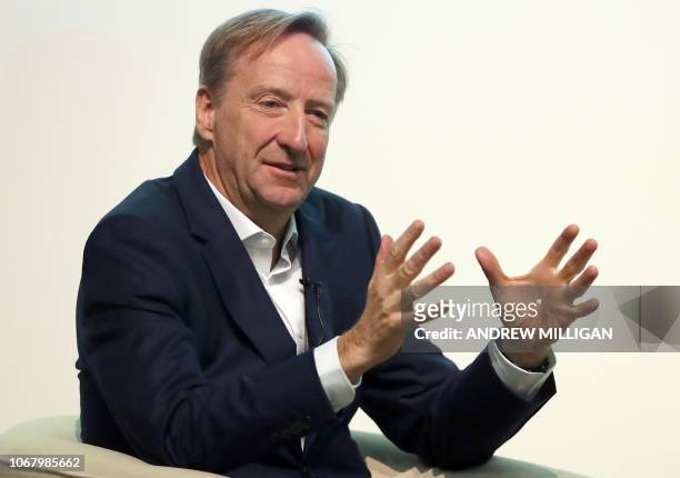Alex Younger, incoming head of Britain's MI6 foreign intelligence agency reacts during a speach about the way in which the intelligence service has,...