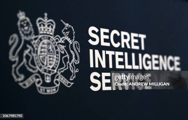 Secret Intelligence Service logo is pictured ahead of a speech by Alex Younger, incoming head of Britain's MI6 foreign intelligence agency, at the...
