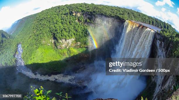 double rainbow against tall scenic waterfall - guyana stock pictures, royalty-free photos & images