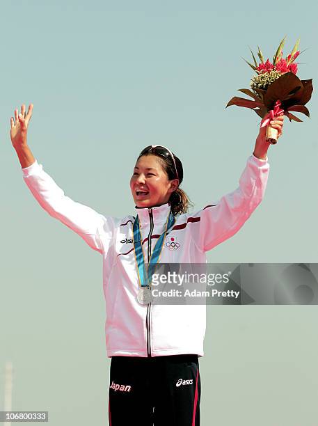 Akane Tsuchihashi of Japan celebrates with the Silver medal won in the Women's Individual Triathlon at the Triathlon Venue during day one of the 16th...