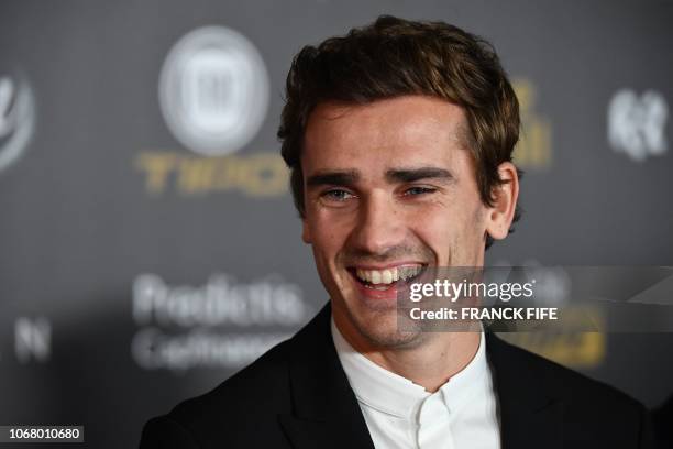 Atletico Madrid's French forward Antoine Griezmann poses upon arrival at the 2018 Ballon d'Or award ceremony at the Grand Palais in Paris on December...