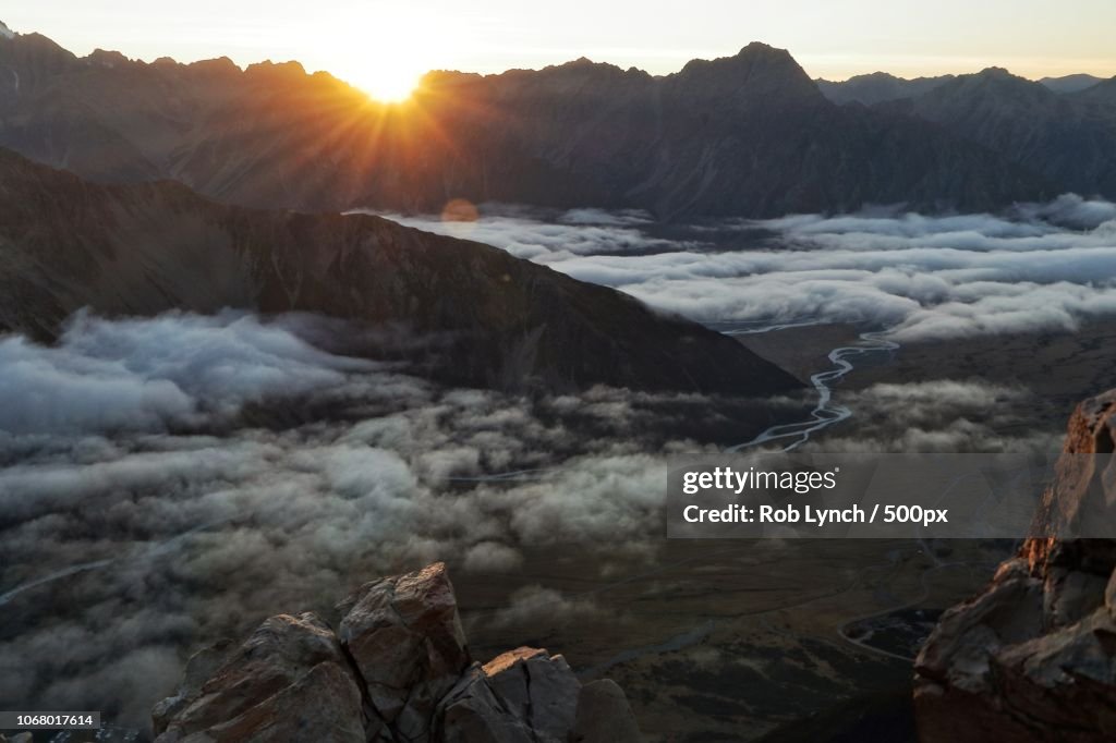 Foggy mountain valley at sunrise