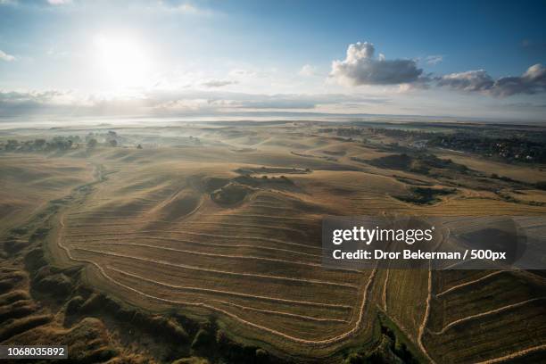 fields from high angle view - ariel fotografías e imágenes de stock