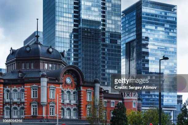 tokyo central railway station and modern business center - modern tradition stock pictures, royalty-free photos & images