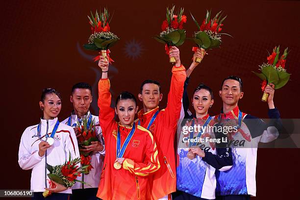 Ayami Kubo, Masayuki Ishihara of Japan, Liang Yujie and Shen Hong of China, Jo Sang Hyo and Lee Se Hee of South Korea attend the award ceremony of...