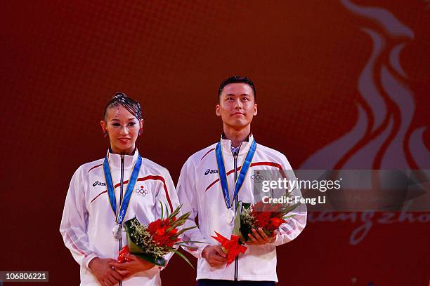 Ayami Kubo, Masayuki Ishihara of Japan win the silver medals of the Standard-Waltz of the Dance Sports at the Zengcheng Gymnasium during day one of...