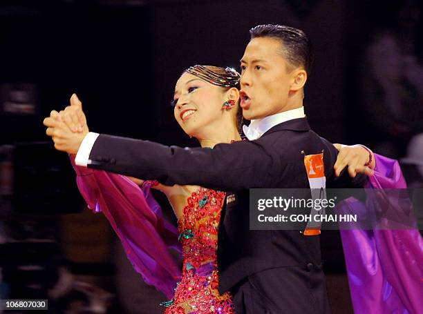 Ayami Kubo and Masayuki Ishihara compete in the dancesport standard quickstep event at the 16th Asian Games in Guangzhou on November 13, 2010. Kubo...