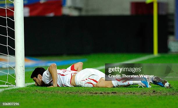 Ciprian Marica of Stuttgart lies on the pitch during the Bundesliga match between 1.FC Kaiserslautern and VFB Stuttgart at Fritz-Walter-Stadion on...