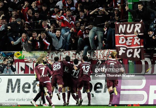 Players and fans of Kaiserslautern celebrate after Mathias Abel scored the 3:3 during the Bundesliga match between 1.FC Kaiserslautern and VFB...