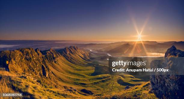 sunrise over mountains - hastings stock pictures, royalty-free photos & images