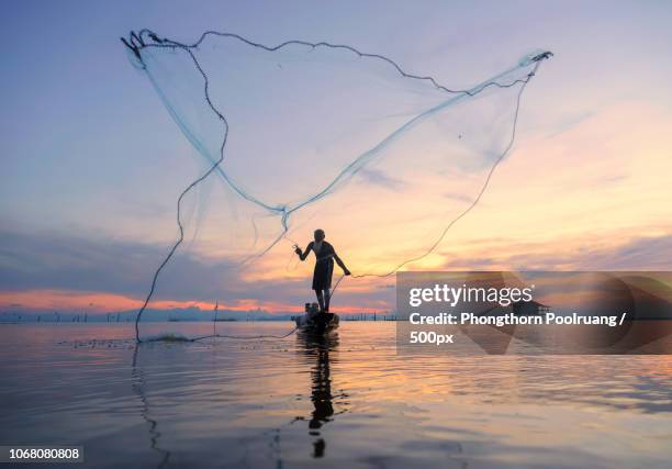 2,582 Throwing Fishing Net Stock Photos, High-Res Pictures, and