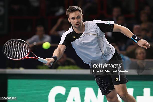 Robin Soderling of Sweden in action against Michael Llodra of France in the semi-final during Day Seven of the ATP Masters Series Paris at the Palais...