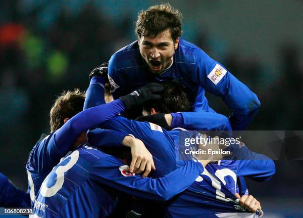 Kevin Kuranyi , Adrian Ropotan and Vladimir Granat of FC Dinamo Moscow celebrate after scoring a goal during the Russian Football League Championship...