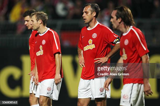 Adam Szalai, Bo Svensson, Nikolce Noveski and Christian Fuchs of Mainz react during the Bundesliga match between FSV Mainz 05 and Hannover 96 at the...