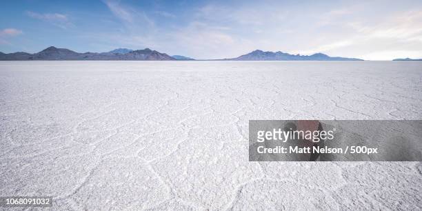 landscape with salt flats and mountains - salt lake city stock pictures, royalty-free photos & images
