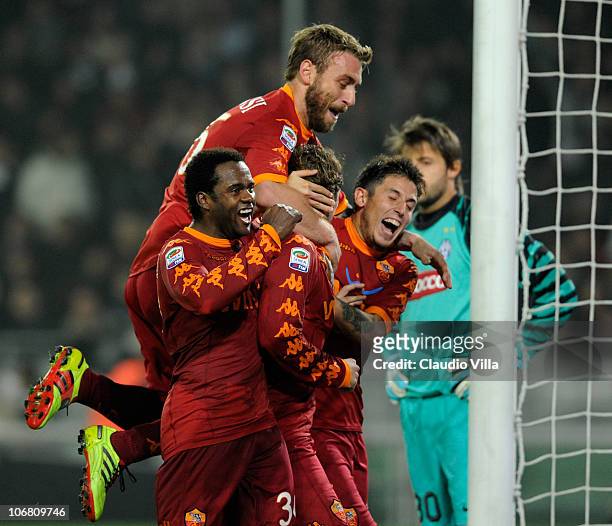 Fabio Simplicio, Daniele De Rossi, Francesco Totti and Leandro Greco of AS Roma celebrates scoring the first goal during the Serie A match between...