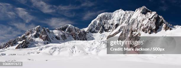 scenic view of snowcapped glacier - snowcapped mountain stock pictures, royalty-free photos & images