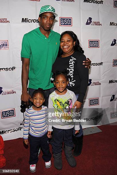 Wounder warrior and family pose during Microsoft and the USO's "A Salute To Our Troops" Wounded Warrior Luncheon at Hard Rock Cafe - Times Square on...