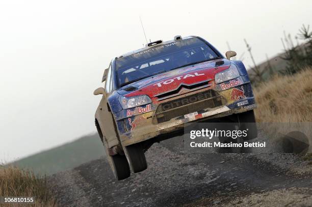 Sebastien Loeb of France and Daniel Elena of Monaco compete in their Citroen C4 WRT during Leg 2 of the WRC Wales Rally GB on November 13, 2010 in...