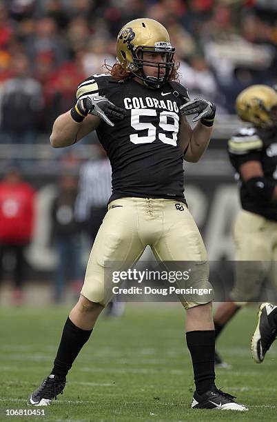 Linebacker BJ Beatty of the Colorado Buffaloes celebrates after sacking quarterback Austen Arnaud of the Iowa State Cyclones at Folsom Field on...