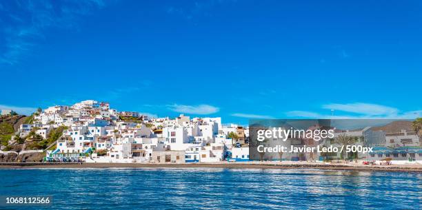 sunny day in village of las playitas, fuerteventura, canary island, spain - insel fuerteventura stock-fotos und bilder