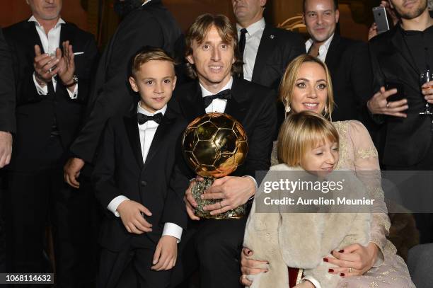 Luka Modric of Croatia and Real Madrid poses with his wife Vanja Bosnic and their children Ivano and Ema after winning the 2018 Ballon D'Or at Le...