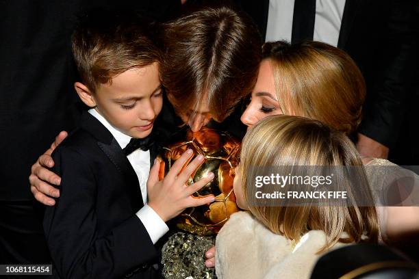 Men's Ballon d'Or award for best player of the year's Real Madrid's Croatian midfielder Luka Modric , his wife Vanja , his son Ivano and his daughter...