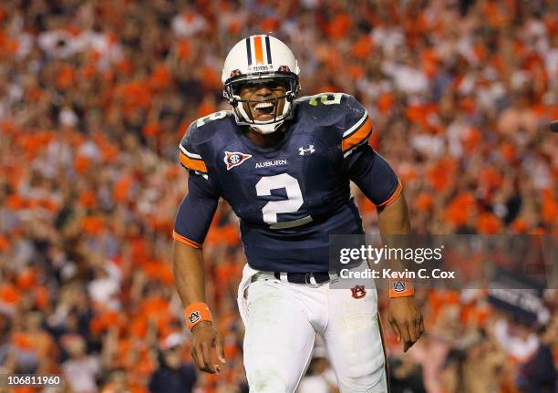 Quarterback Cameron Newton of the Auburn Tigers celebrates after a touchdown against the Georgia Bulldogs at Jordan-Hare Stadium on November 13, 2010...