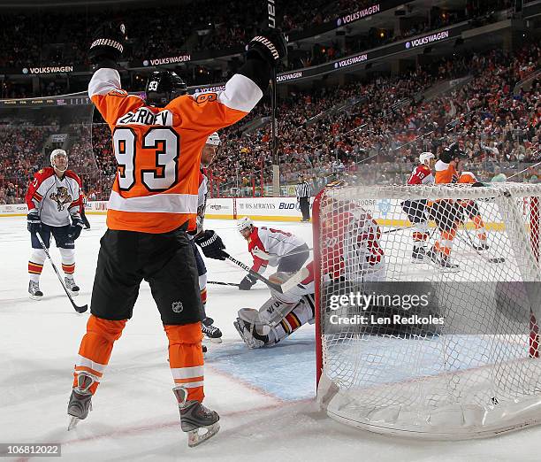 Nikolay Zherdev of the Philadelphia Flyers celebrates a first-period goal by teammate Mike Richards against Scott Clemmensen of the Florida Panthers...