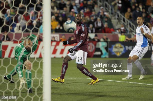 Omar Cummings of the Colorado Rapids watches as a shot by Kosuke Kimura goes into the goal as goalkeeper Jon Busch of the San Jose Earthquakes is too...
