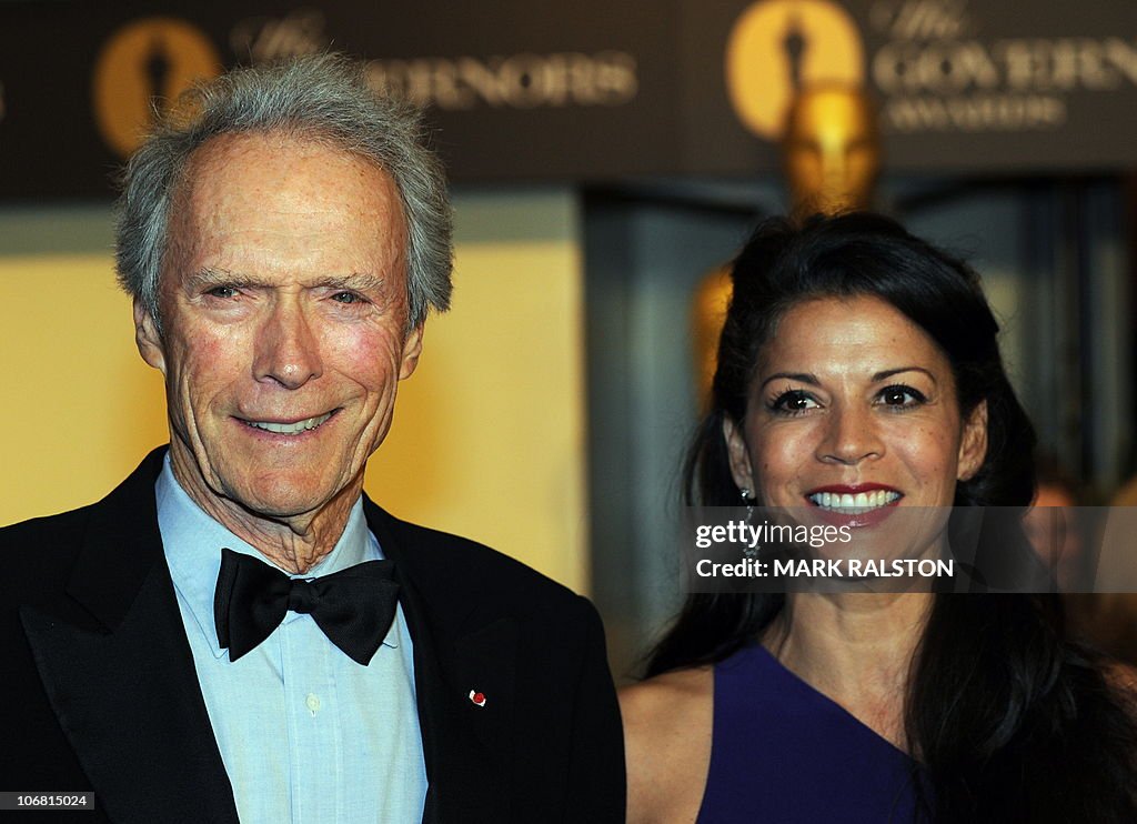 Actor Clint Eastwood and partner arrive