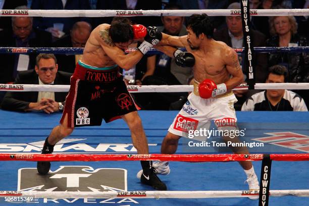 Manny Pacquiao of the Philippines lands a punch against Antonio Margarito of Mexico during their WBC World Super Welterweight Title bout at Cowboys...