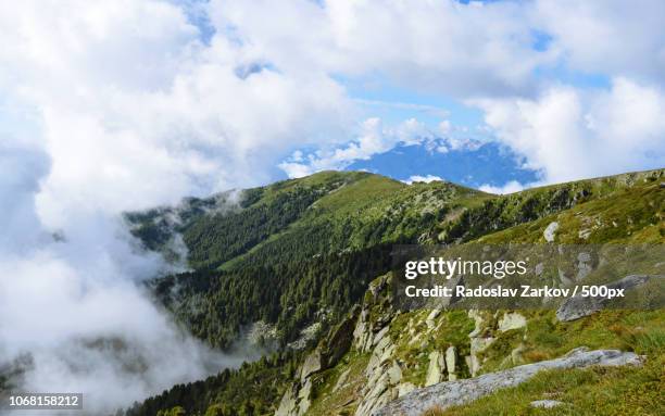 scenic view of mountains with fog - pirin mountains stock pictures, royalty-free photos & images