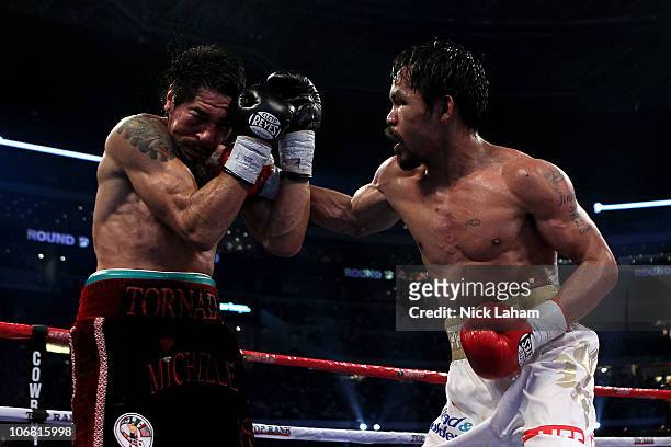 Manny Pacquiao of the Philippines lands a punch against Antonio Margarito of Mexico during their WBC World Super Welterweight Title bout at Cowboys...