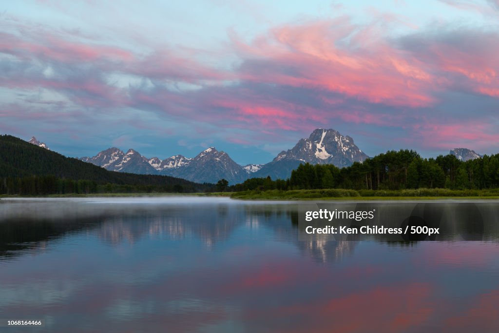 Landscape with river and snowcapped mountains