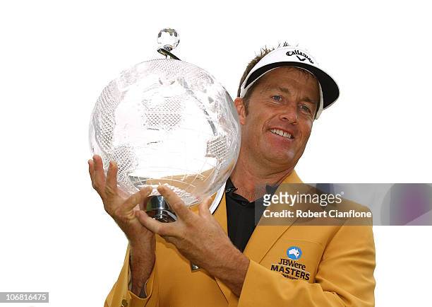 Stuart Appleby of Australia holds the winners trophy after he won the Australian Masters at The Victoria Golf Club on November 14, 2010 in Melbourne,...