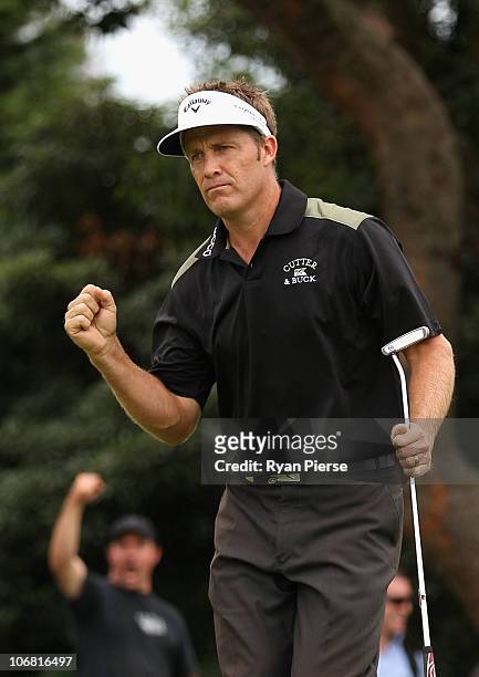 Stuart Appleby celebrates after a birdie on the 17th hole during round four of the Australian Masters at The Victoria Golf Club on November 14, 2010...