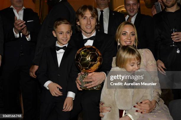 Luka Modric of Croatia and Real Madrid poses with his wife Vanja Bosnic and their children Ivano and Ema after he won the 2018 Ballon D'Or at Le...