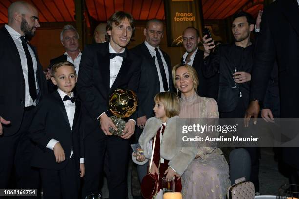 Luka Modric of Croatia and Real Madrid poses with his wife Vanja Bosnic and their children Ivano and Ema after he won the 2018 Ballon D'Or at Le...