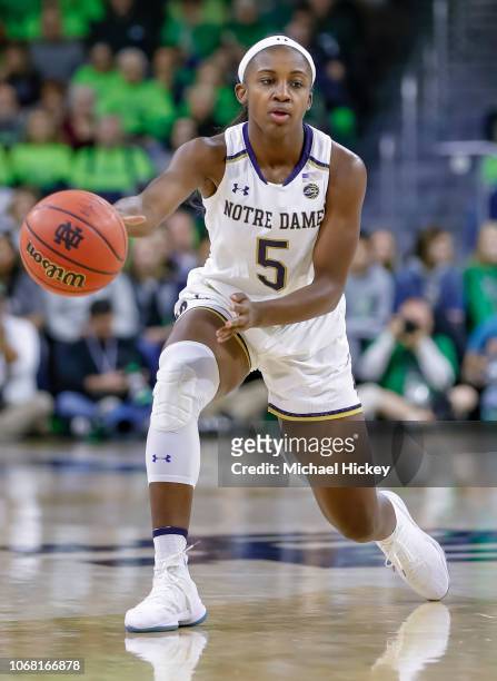 Jackie Young of the Notre Dame Fighting Irish passes the ball off during the game against the Connecticut Huskies at Purcell Pavilion on December 2,...