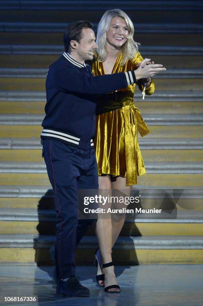 Ada Hegerberg of Sweden and Olympioque Lyonnais dances with French DJ Martin Solveig after she won the 2018 Ballon D'Or at Le Grand Palais on...