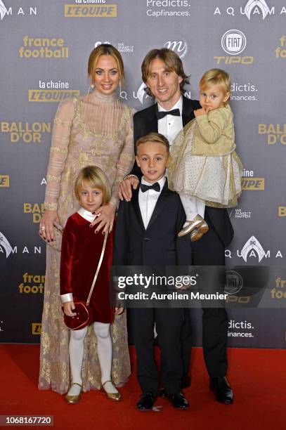 Luka Modric of Croatia and Real Madrid poses with his wife Vanja Bosnic and their children Ivano and Ema as they arrive to the 2018 Ballon D'Or...