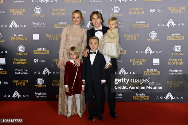 Luka Modric of Croatia and Real Madrid poses with his wife Vanja Bosnic and their children Ivano and Ema as they arrive to the 2018 Ballon D'Or...